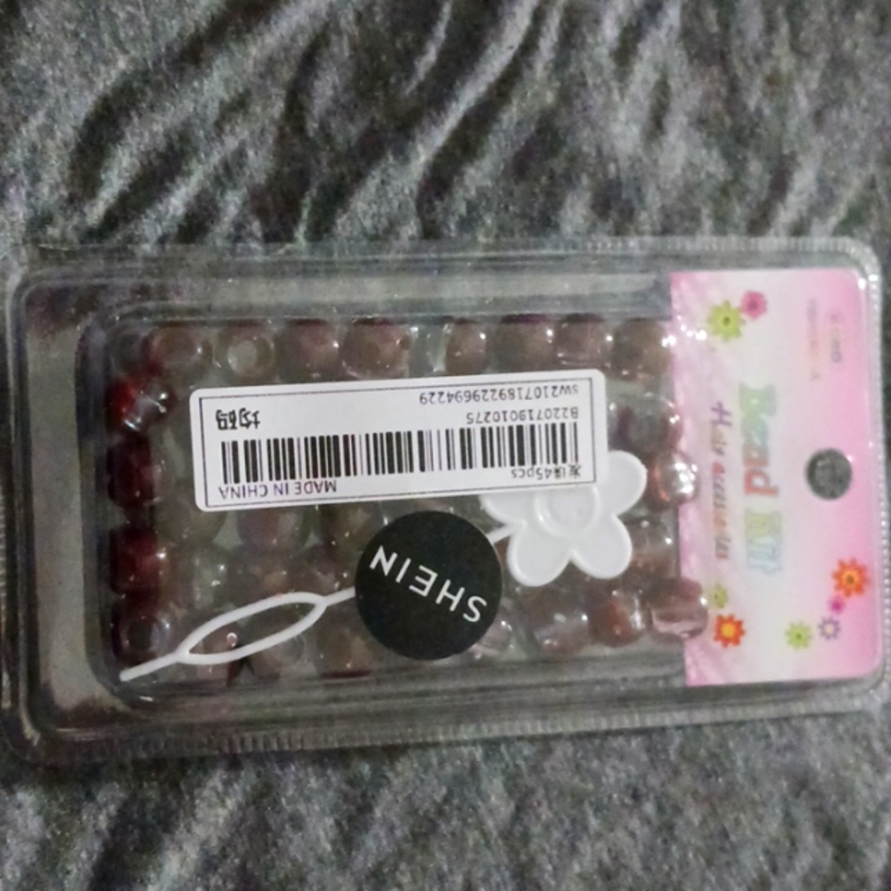 Beads for braiding hair
